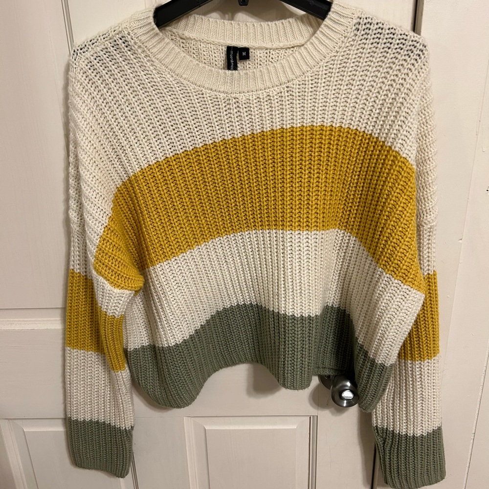 Woman’s striped sweater